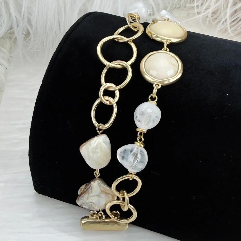 Elegant Goldtone and Cream two strand magnetic closure Bracelet